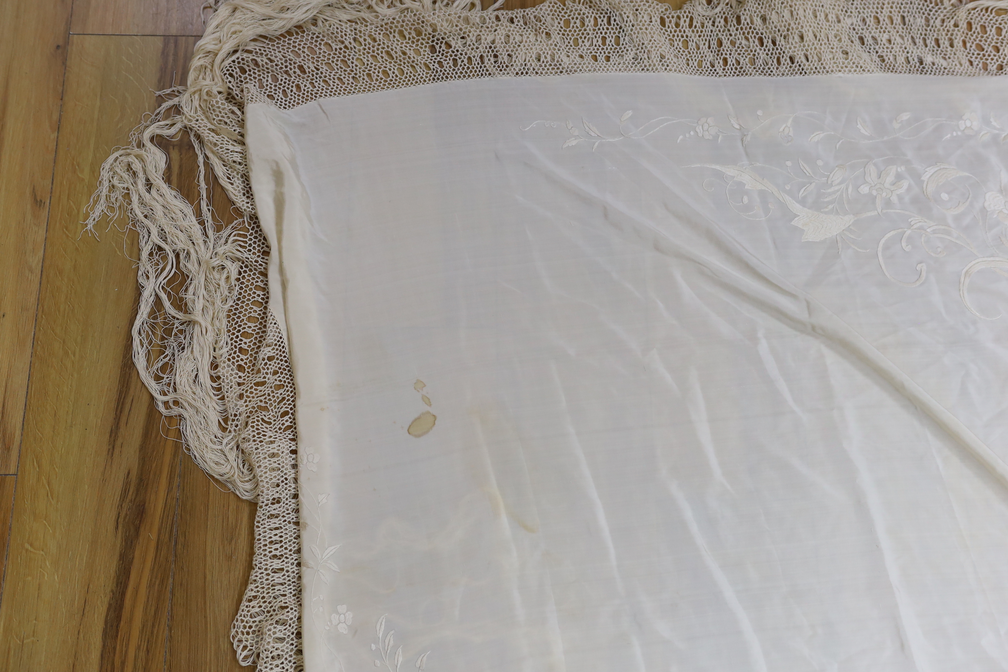 Two silk cream on cream Chinese embroidered shawls